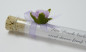 Preview: Gastgeschenk im Reagenzglas, Glasröhrchen und Hochzeitsmandeln mit einer Rose in Lila_4