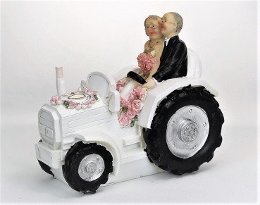 Goldpärchen auf dem Traktor, Seitenansicht