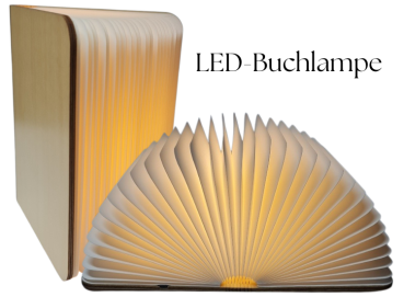 Faltbare LED Buchlampe aus hellem Holz mit cremefarbenen Seiten im geöffneten Zustand