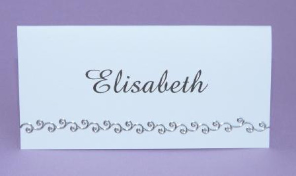 Tischkarte mit einem silberfarbenen Ornament 1