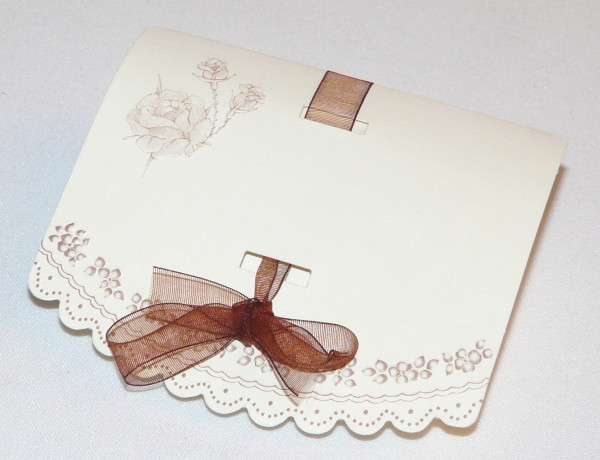 Gastgeschenk Rosentau mit Organzaschleife 1 Gastgeschenk Rosentau mit Organzaschleife 1