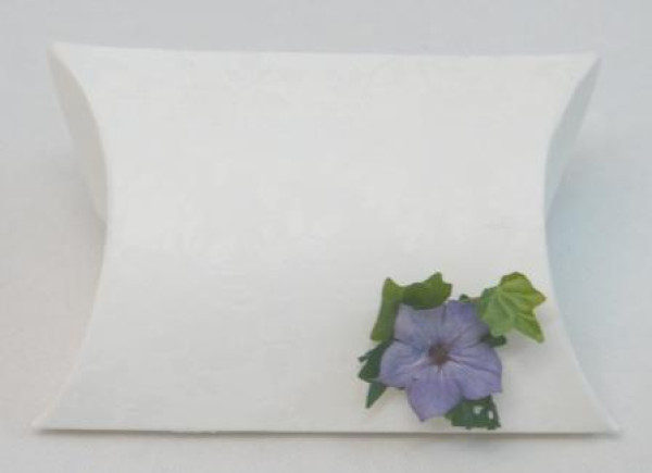 Gastgeschenk Kissen mit einer kleinen Blume 1 Gastgeschenk Kissen mit einer kleinen Blume 1