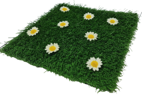 Grasfliese mit kleinen Blumen. Tischdeko zu Ostern, Frühling