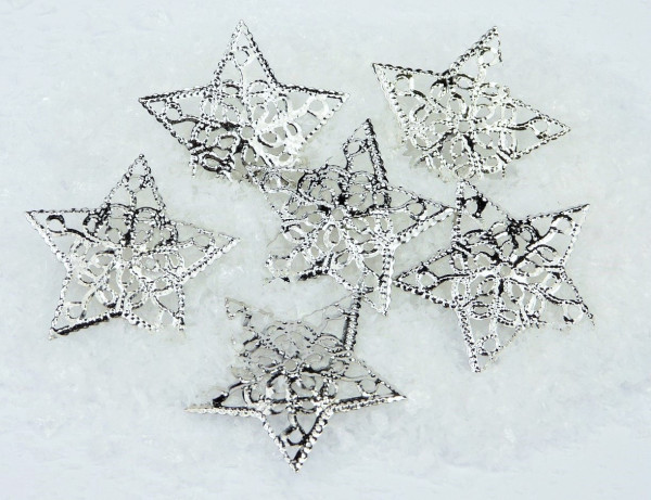10 silberfarbene Sterne mit Ornamenten 2