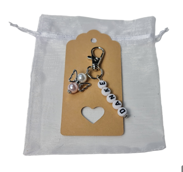 Gastgeschenk, Anhänger - mit einem kleinen Schutzengel in der Farbe Zartrosa und dem Wort "Danke" - 1 Gastgeschenk, Anhänger - mit einem kleinen Schutzengel in der Farbe Zartrosa und dem Wort "Danke" - 1